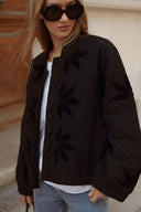 Veste matelassée femme noir brodée automne tendance Péplum