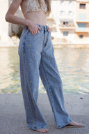 Jean large taille haute bleu clair avec fleurs brodées femme été tendance bohème Renald